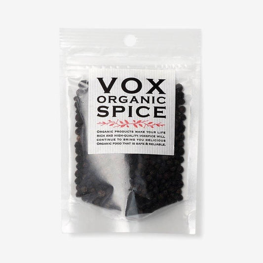 ヴォークス スパイスの有機ブラックペパーホール20g。黒い丸粒が見える透明袋と白いVOXラベル