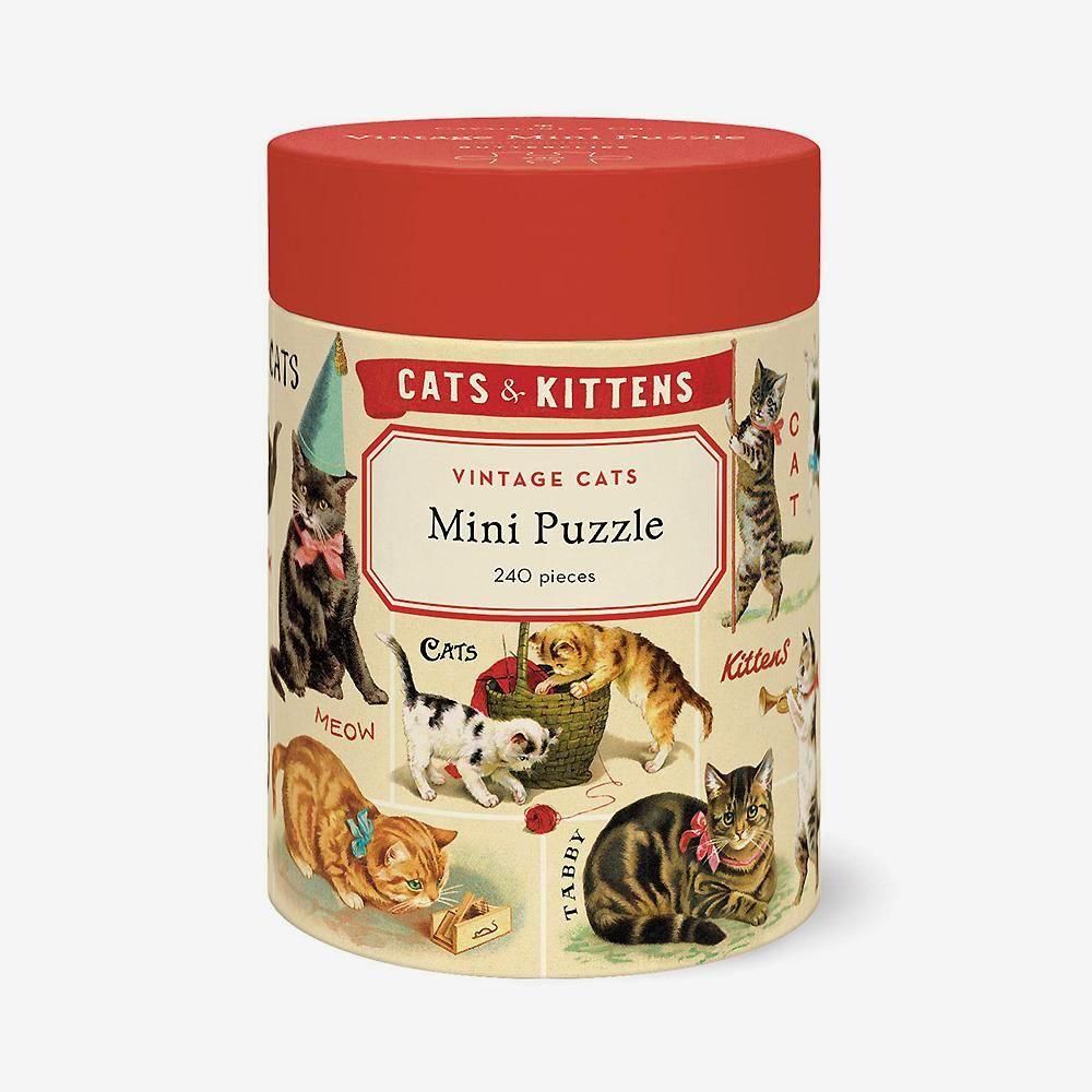 カバリーニ ビンテージパズル240ピースのキャット。赤いふたと様々な猫の絵の円筒形パッケージ